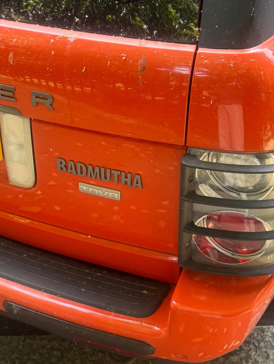 Orange Range Rover, rear badge detail